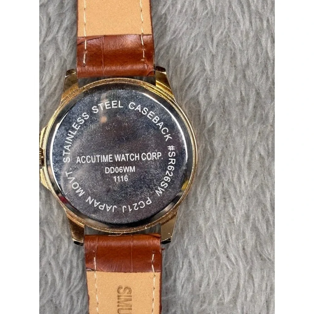 Accutime Watch Corp Stainless Steel‎ Caseback Gold Tone Black Face